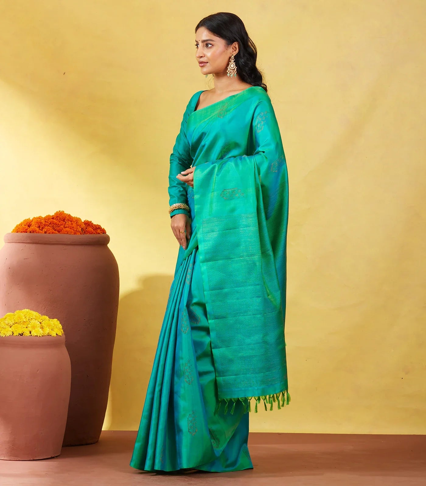 Sea Green Soft Silk Saree With Floral Zari Buttas