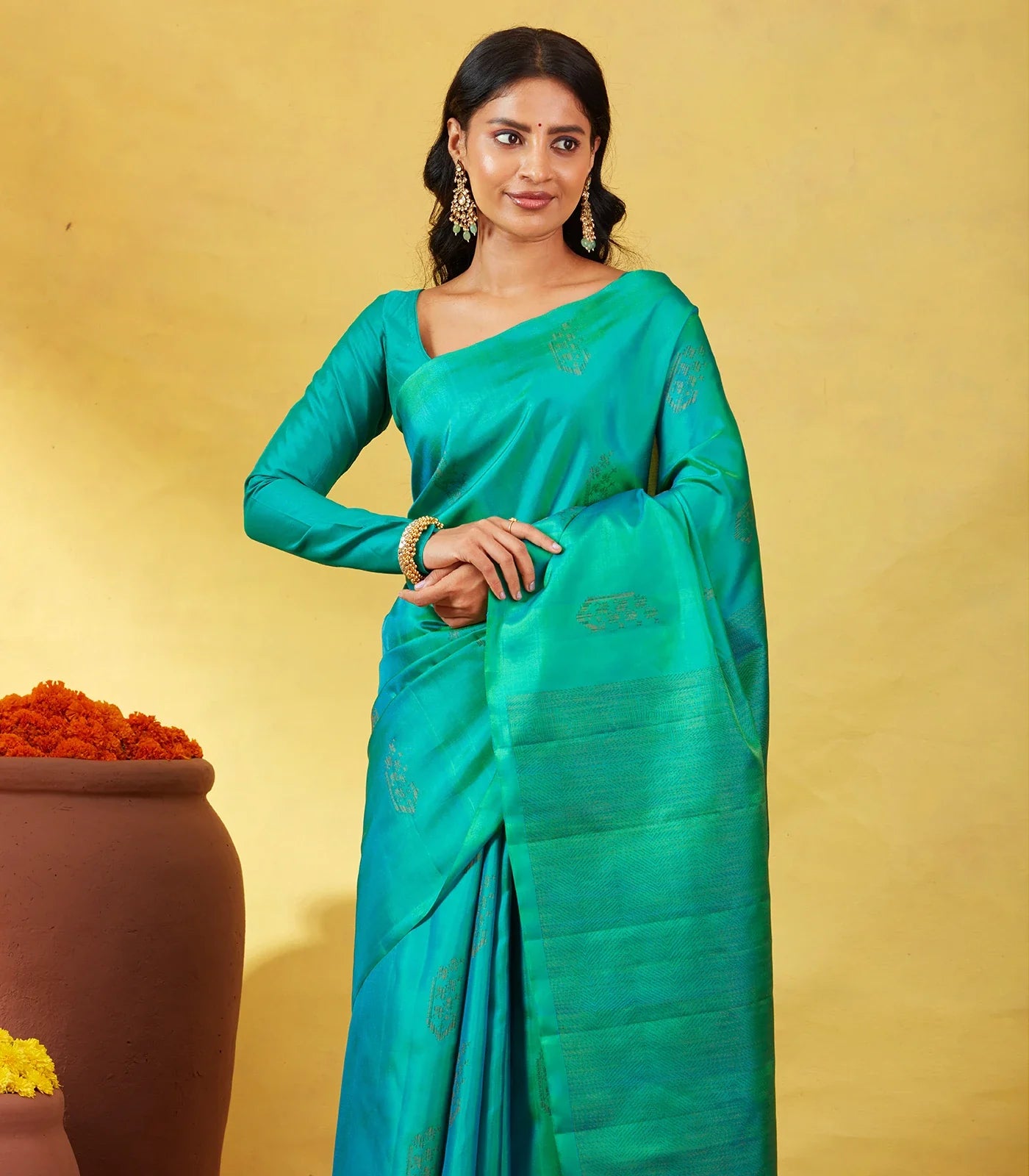 Sea Green Soft Silk Saree With Floral Zari Buttas
