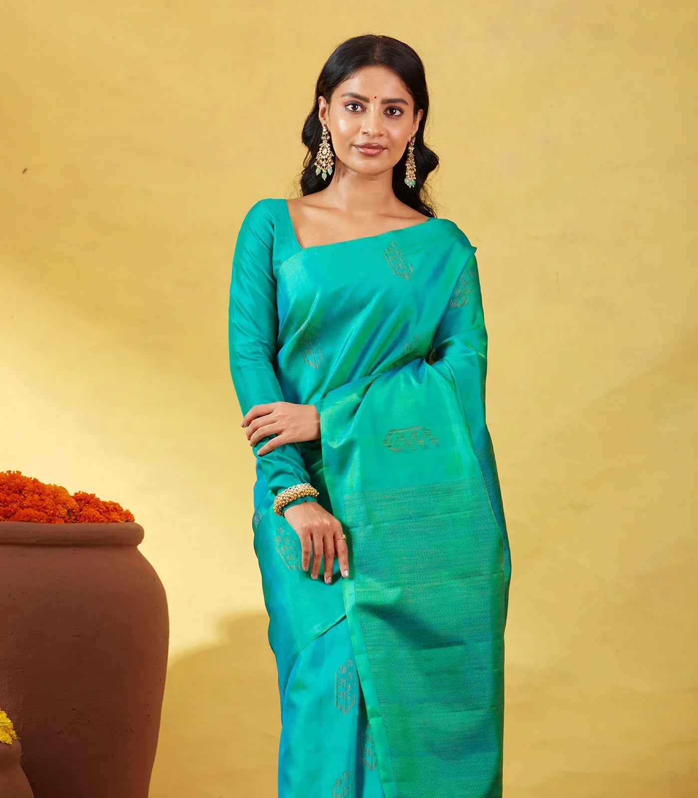 Sea Green Soft Silk Saree With Floral Zari Buttas