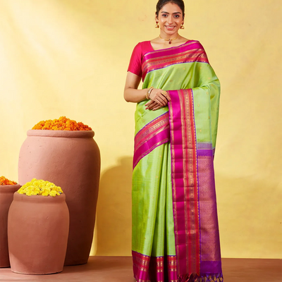 Cardamom Green Handloom Kanchipuram Korvai Silk Saree With Zari Stripes & Buttas