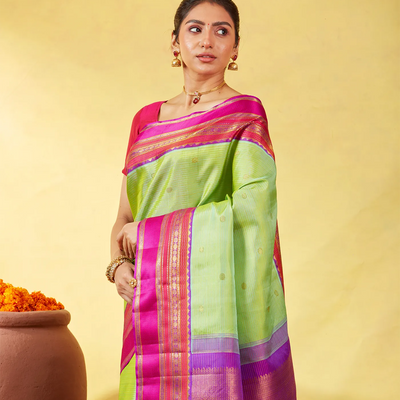Cardamom Green Handloom Kanchipuram Korvai Silk Saree With Zari Stripes & Buttas