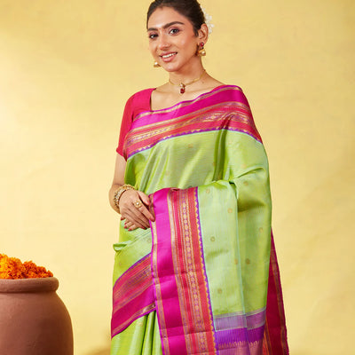 Cardamom Green Handloom Kanchipuram Korvai Silk Saree With Zari Stripes & Buttas
