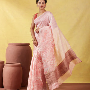 Peach Handwoven Linen Saree Printed With Flower Motifs