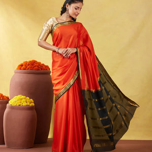Orange Mysore Plain Crepe Silk Saree With Black Border