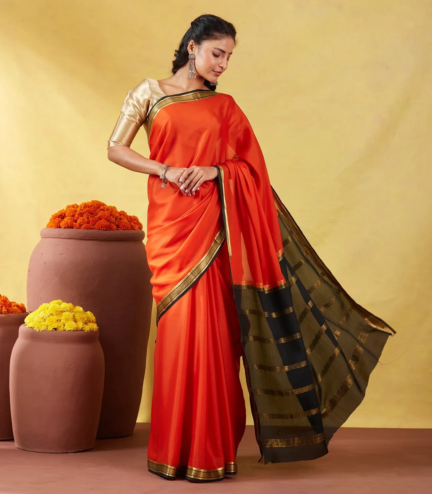 Orange Mysore Plain Crepe Silk Saree With Black Border