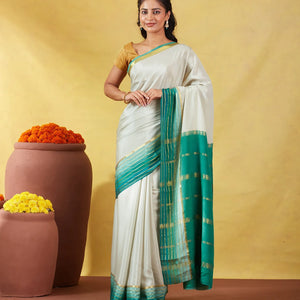 Light Green Mysore Plain Crepe Silk Saree With Contrast Green Border