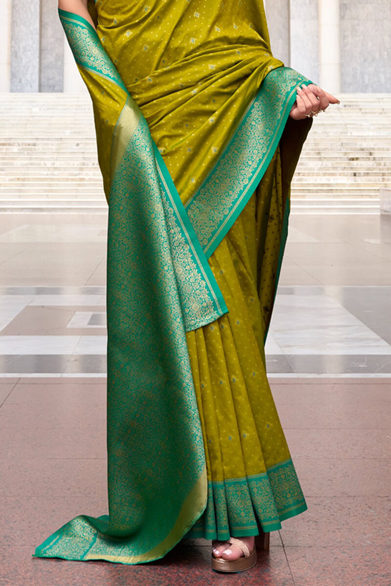 Lagniappe Mehndi Soft Banarasi Silk Saree With Staggering Blouse Piece