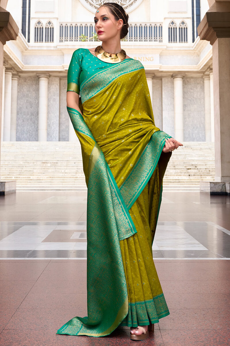 Lagniappe Mehndi Soft Banarasi Silk Saree With Staggering Blouse Piece