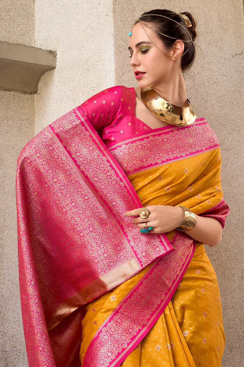 Assemblage Yellow Soft Banarasi Silk Saree With Rhapsody Blouse Piece