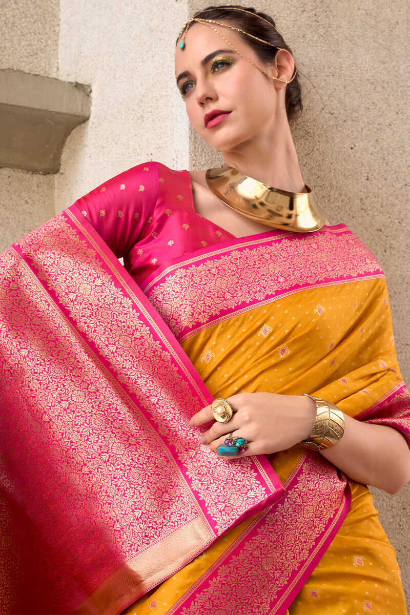 Assemblage Yellow Soft Banarasi Silk Saree With Rhapsody Blouse Piece