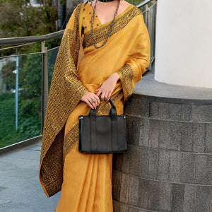 Captivating Yellow Cotton Silk Saree With Adoring Blouse Piece