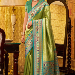 Dissemble Green Soft Banarasi Tissue Silk Saree With Elegant Blouse Piece