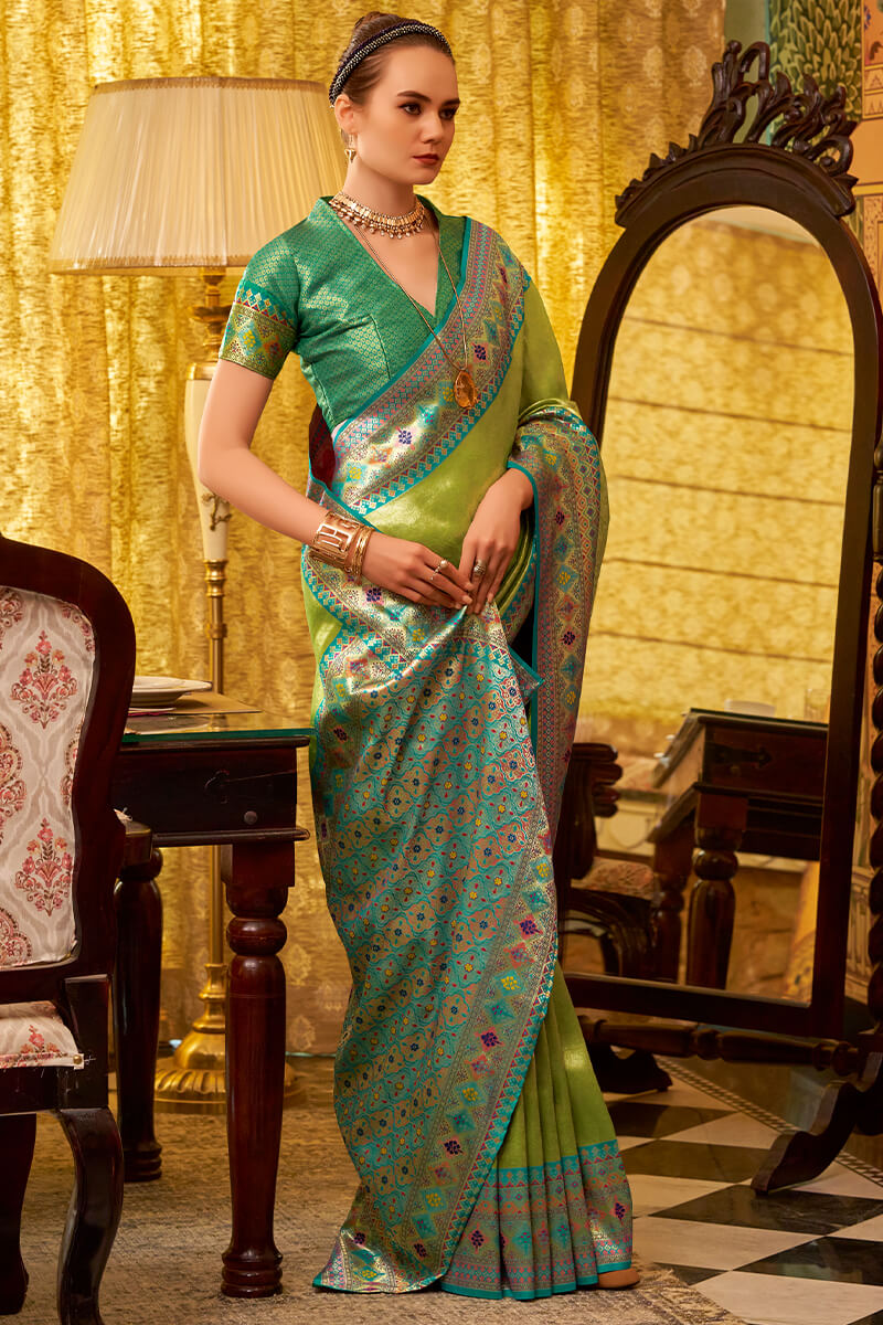 Dissemble Green Soft Banarasi Tissue Silk Saree With Elegant Blouse Piece