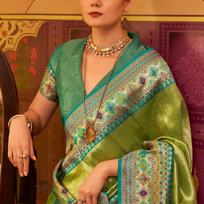 Dissemble Green Soft Banarasi Tissue Silk Saree With Elegant Blouse Piece