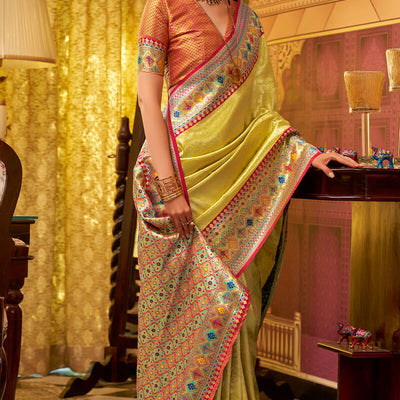 Improbable Yellow Soft Banarasi Tissue Silk Saree With Luminous Blouse Piece