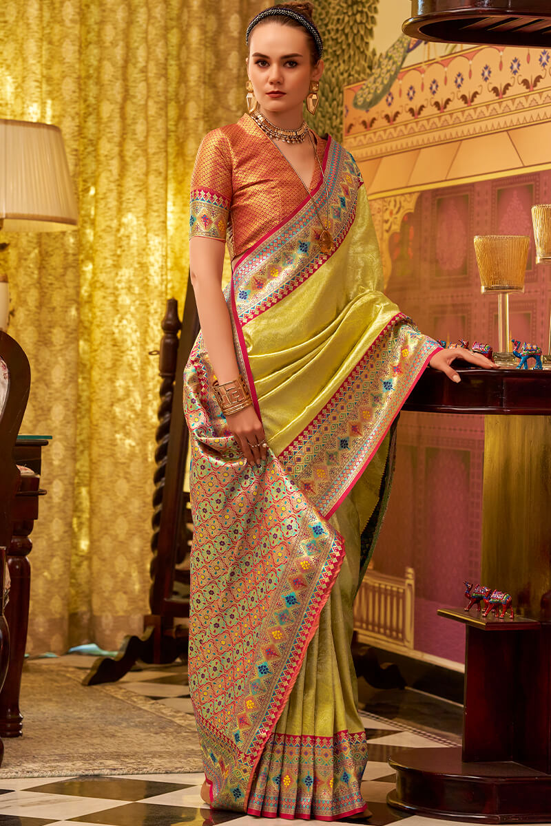 Improbable Yellow Soft Banarasi Tissue Silk Saree With Luminous Blouse Piece