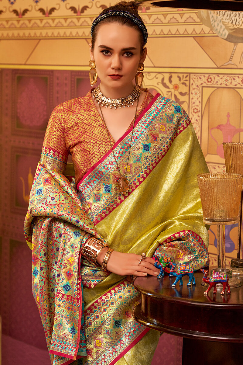 Improbable Yellow Soft Banarasi Tissue Silk Saree With Luminous Blouse Piece