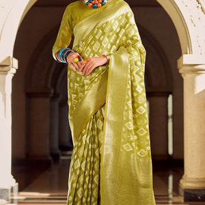 Extraordinary Mehndi Soft Banarasi Tissue Silk Saree With Sizzling Blouse Piece
