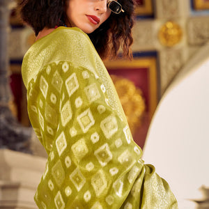 Extraordinary Mehndi Soft Banarasi Tissue Silk Saree With Sizzling Blouse Piece