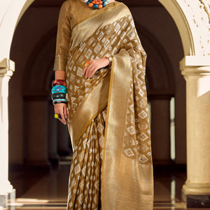 Lassitude Brown Soft Banarasi Tissue Silk Saree With Nectarous Blouse Piece