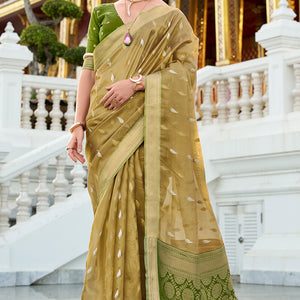 Arresting Green Soft Banarasi Silk Saree With Prettiest Blouse Piece
