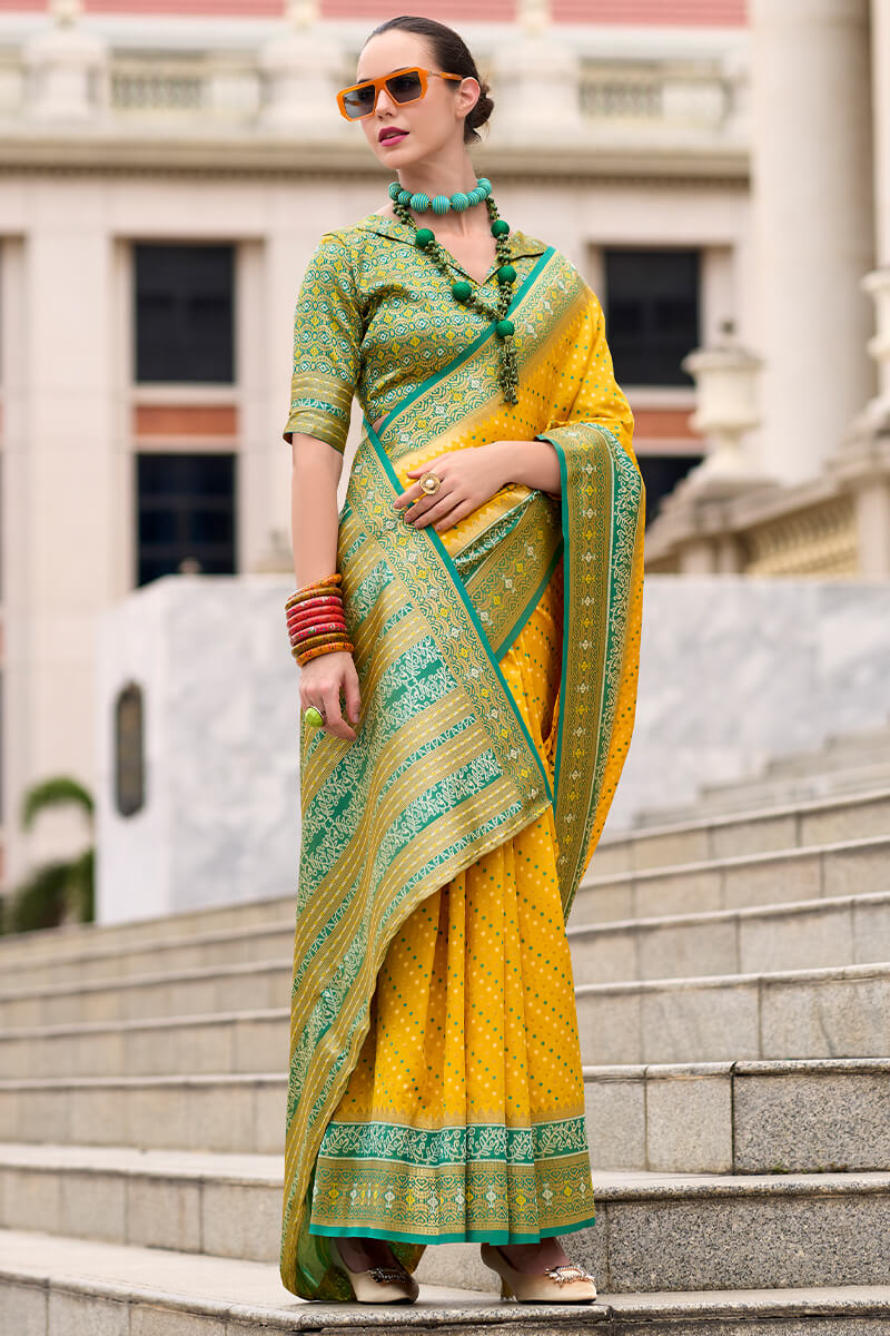 Ebullience Yellow Patola Silk Saree with Embrocation Blouse Piece