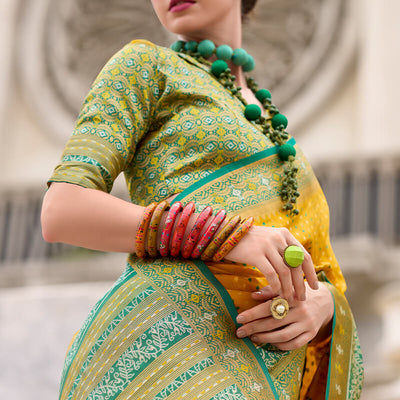 Ebullience Yellow Patola Silk Saree with Embrocation Blouse Piece