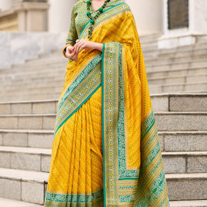 Ebullience Yellow Patola Silk Saree with Embrocation Blouse Piece