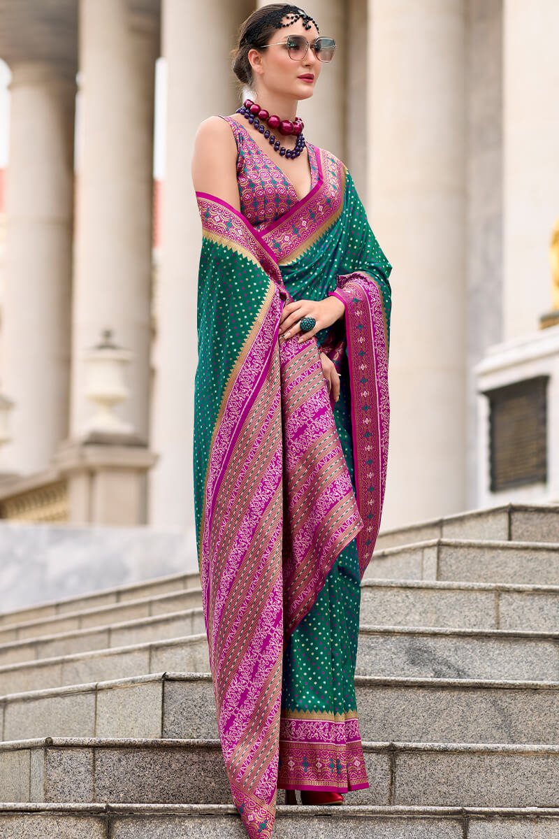 Twirling Dark Green Patola Silk Saree with Confounding Blouse Piece