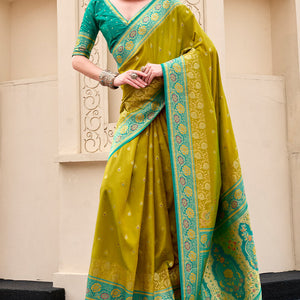 Surpassing Mehndi Soft Banarasi Silk Saree With Tantalizing Blouse Piece
