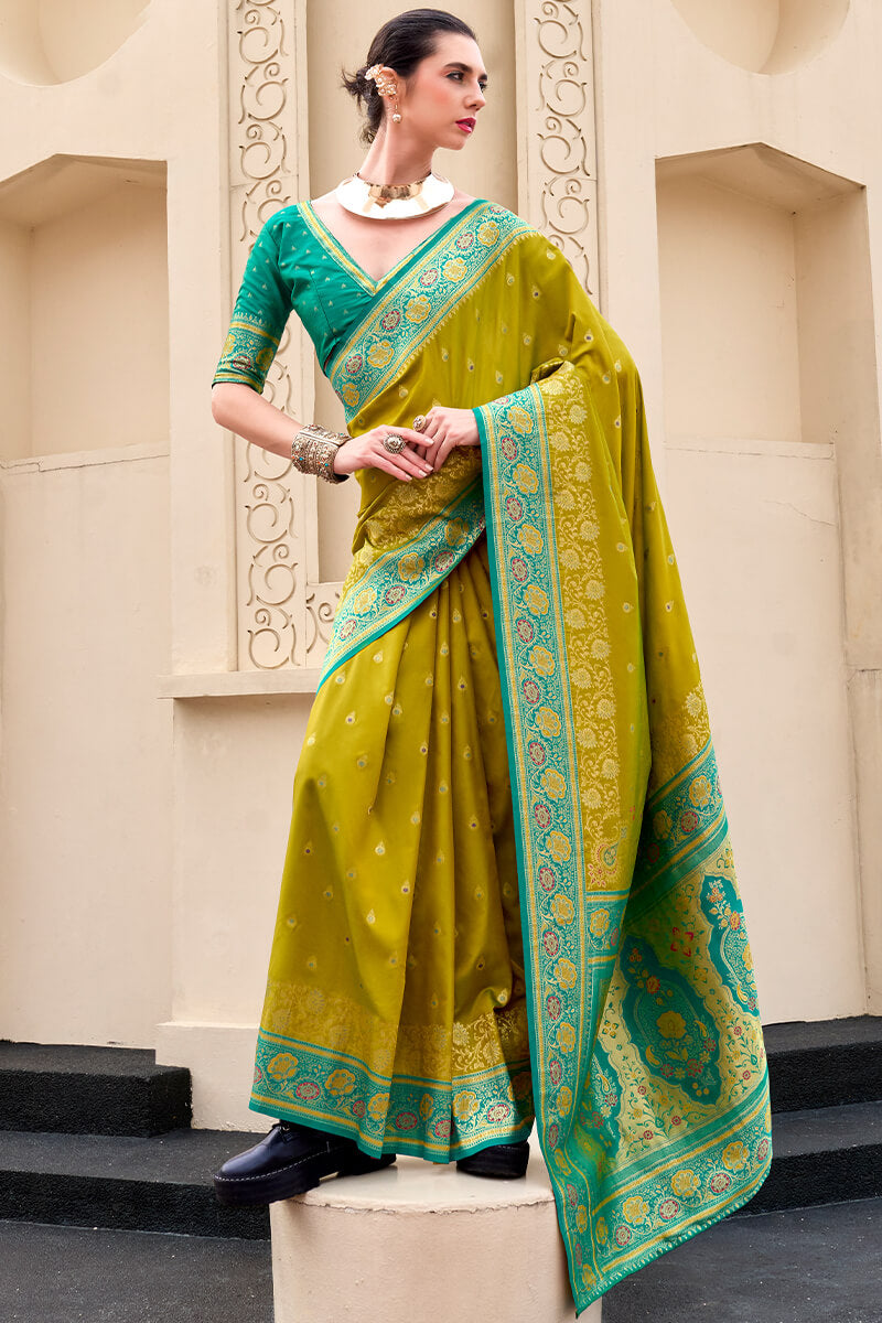 Surpassing Mehndi Soft Banarasi Silk Saree With Tantalizing Blouse Piece