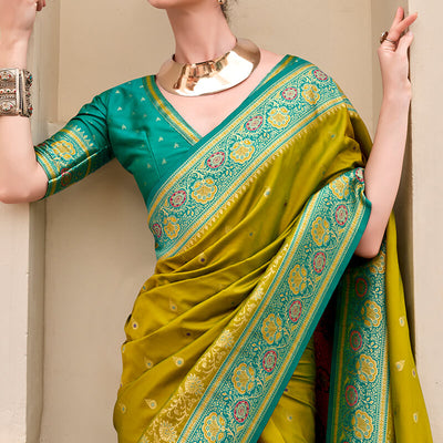 Surpassing Mehndi Soft Banarasi Silk Saree With Tantalizing Blouse Piece