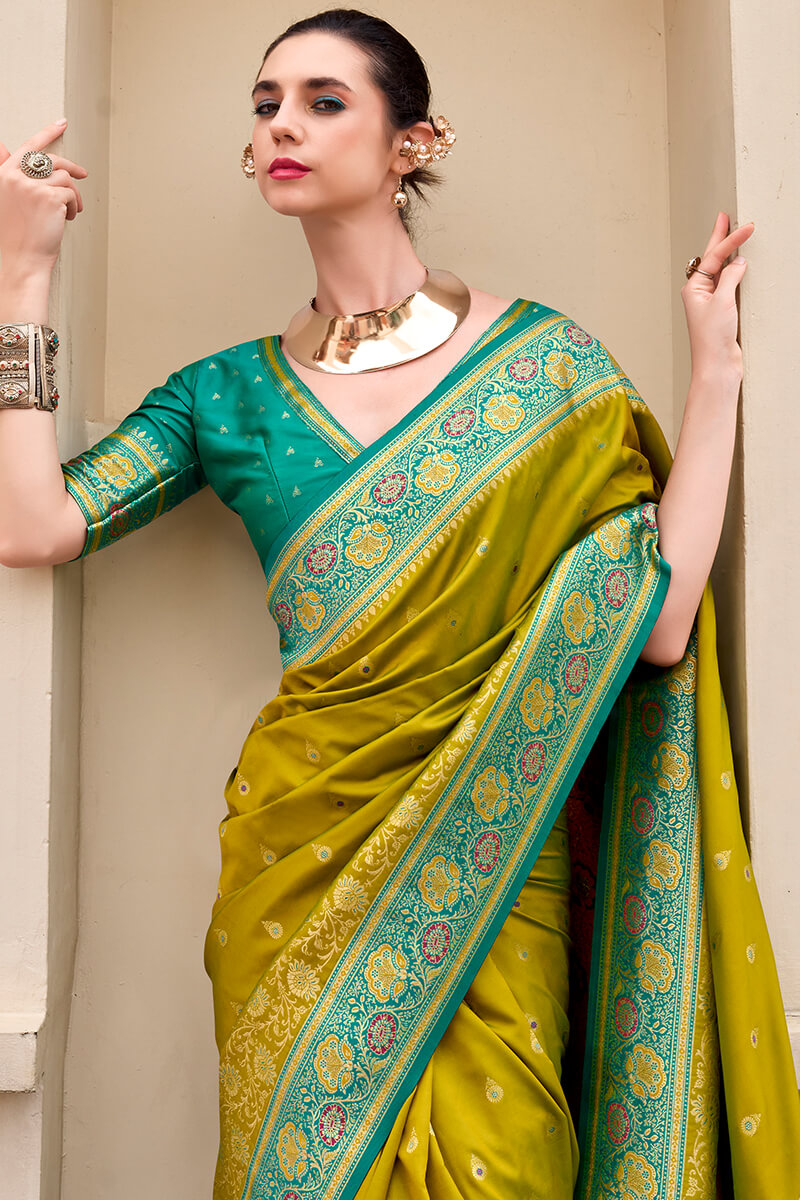 Surpassing Mehndi Soft Banarasi Silk Saree With Tantalizing Blouse Piece