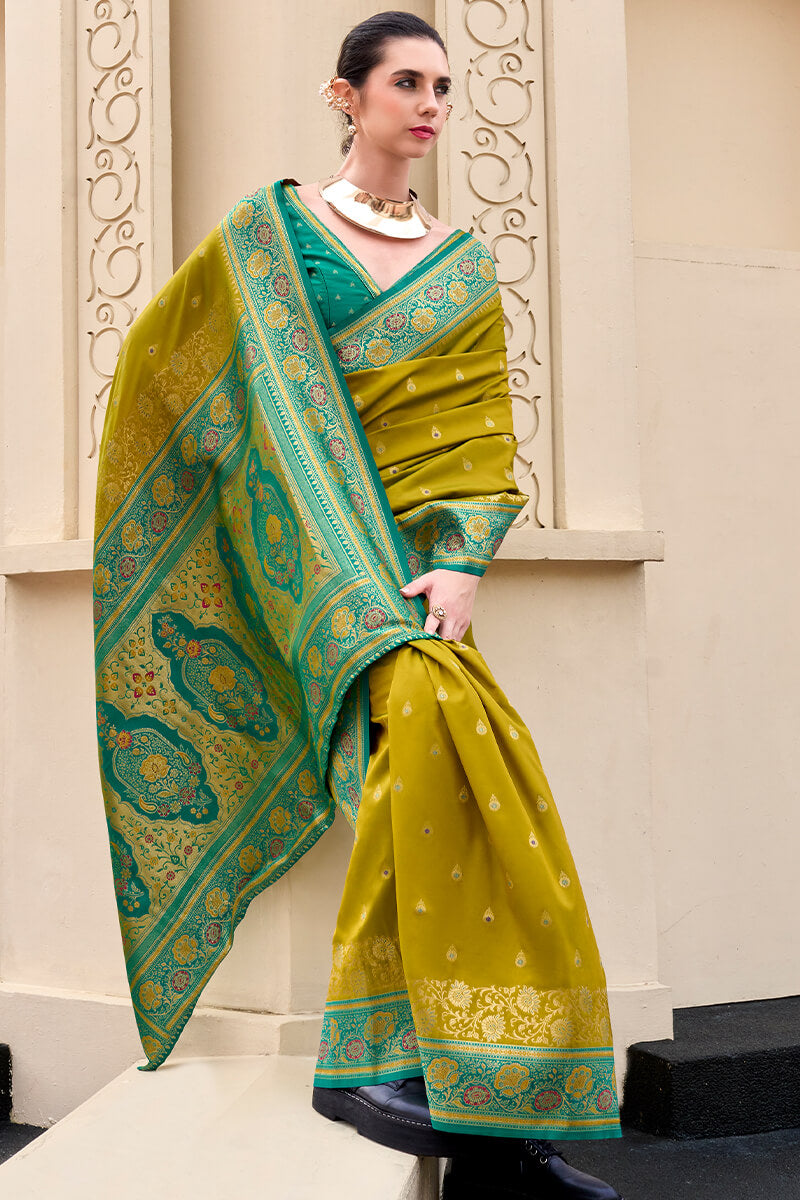 Surpassing Mehndi Soft Banarasi Silk Saree With Tantalizing Blouse Piece