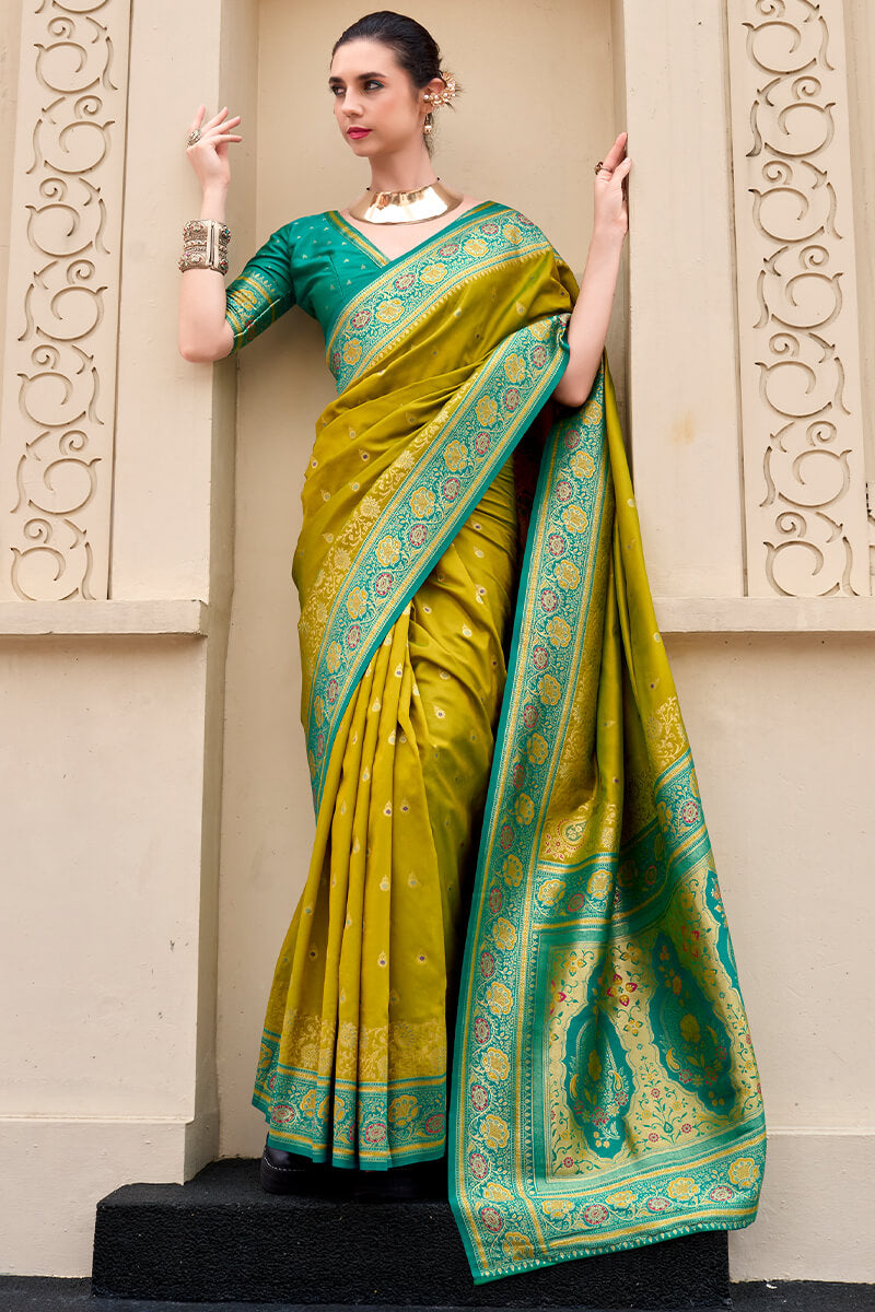 Surpassing Mehndi Soft Banarasi Silk Saree With Tantalizing Blouse Piece