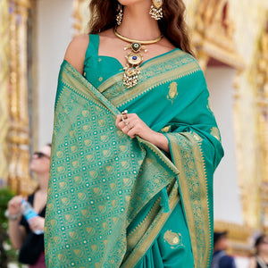 Groovy Turquoise Banarasi Satin Silk Saree With Murmurous Blouse