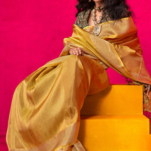 Engrossing Yellow Soft Banarasi Tissue Silk Saree With Scintilla Blouse Piece
