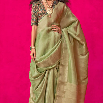 Resonant Green Soft Banarasi Tissue Silk Saree With Beauteous Blouse Piece