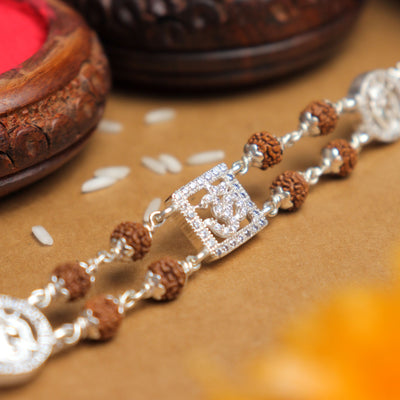 Silver Rakhi with Rudraksha, Om, and Ganesh, Double Line Design