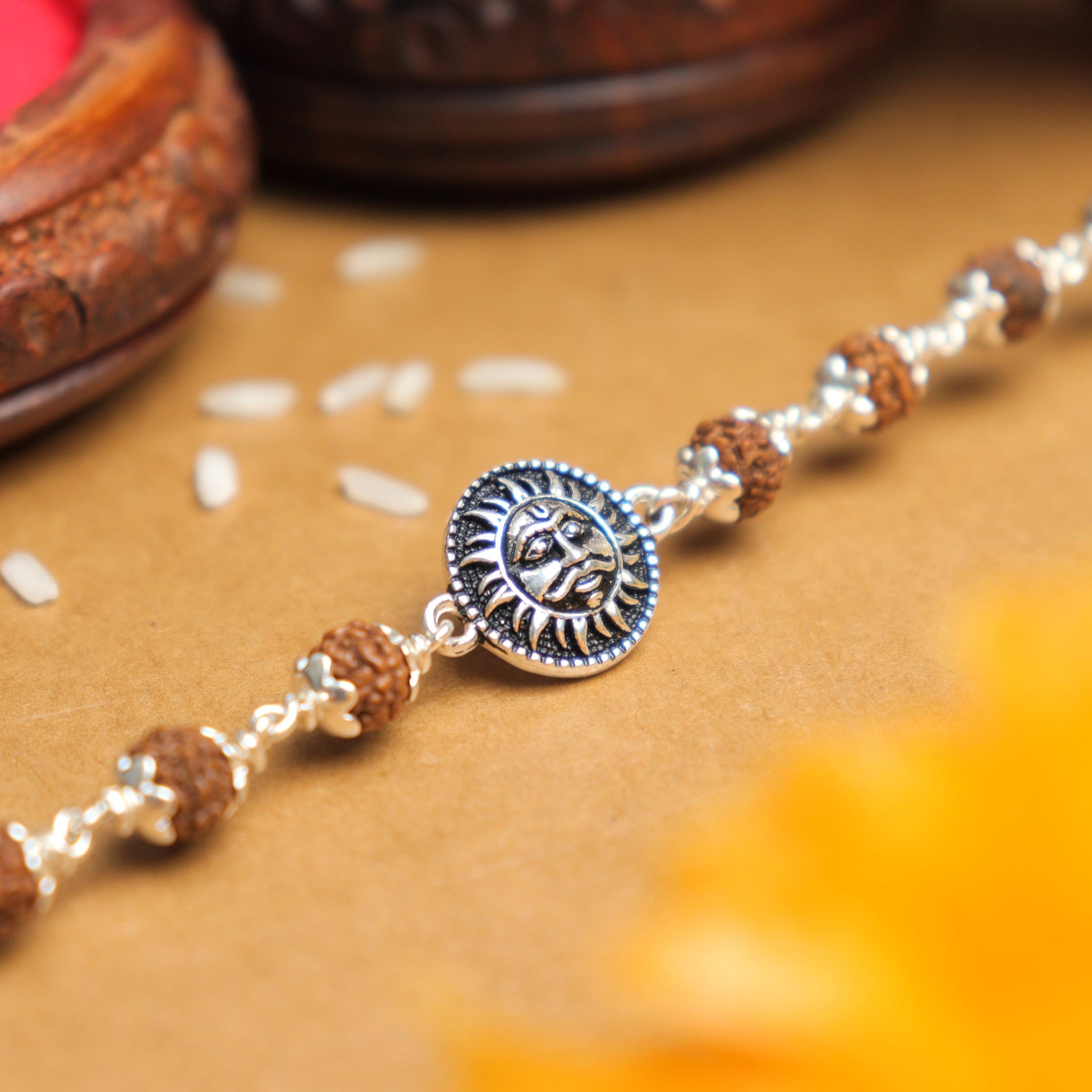 Silver Rakhi with Suryadev and Rudraksha