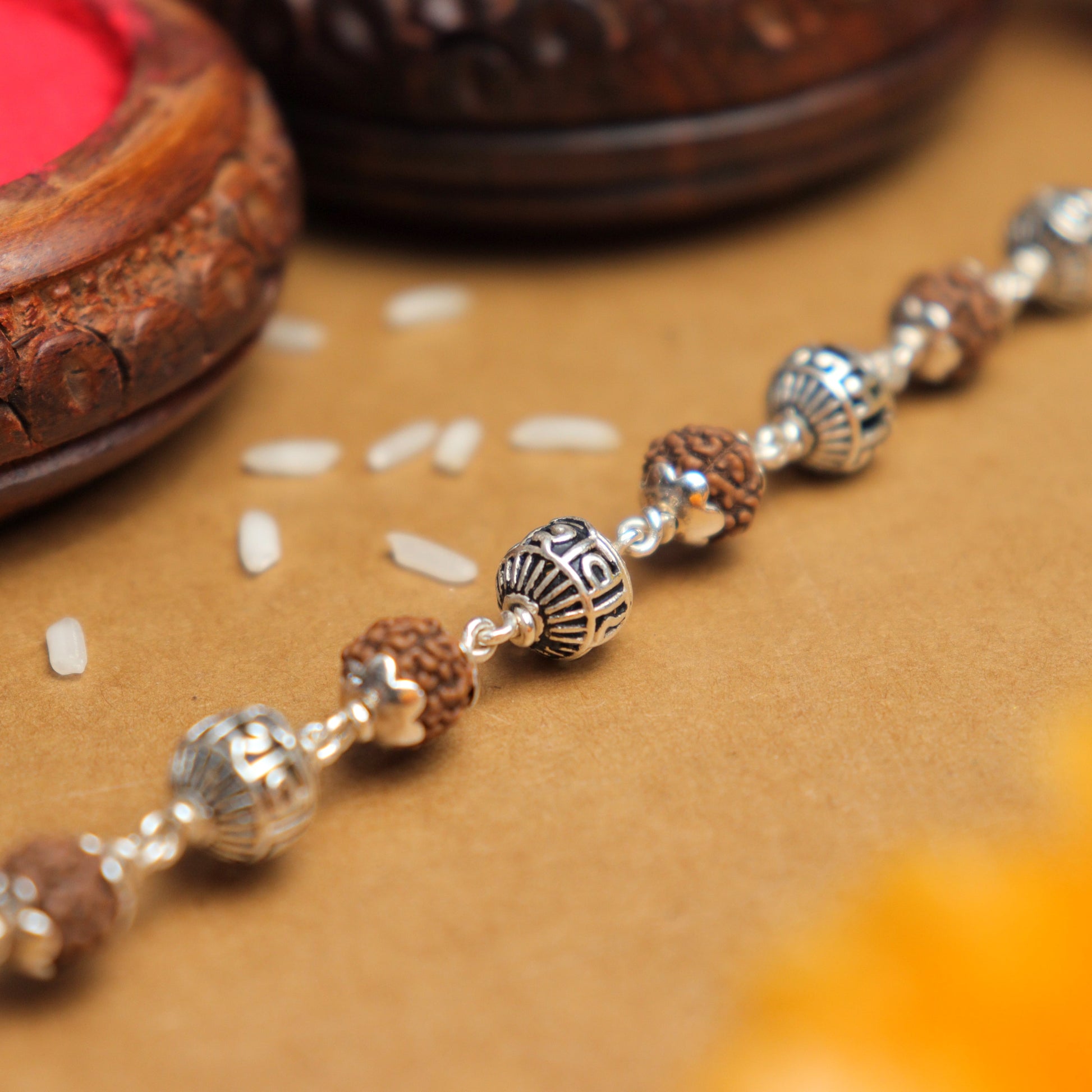 Silver Rakhi with Rudraksha and Om Namah Shivay Beads