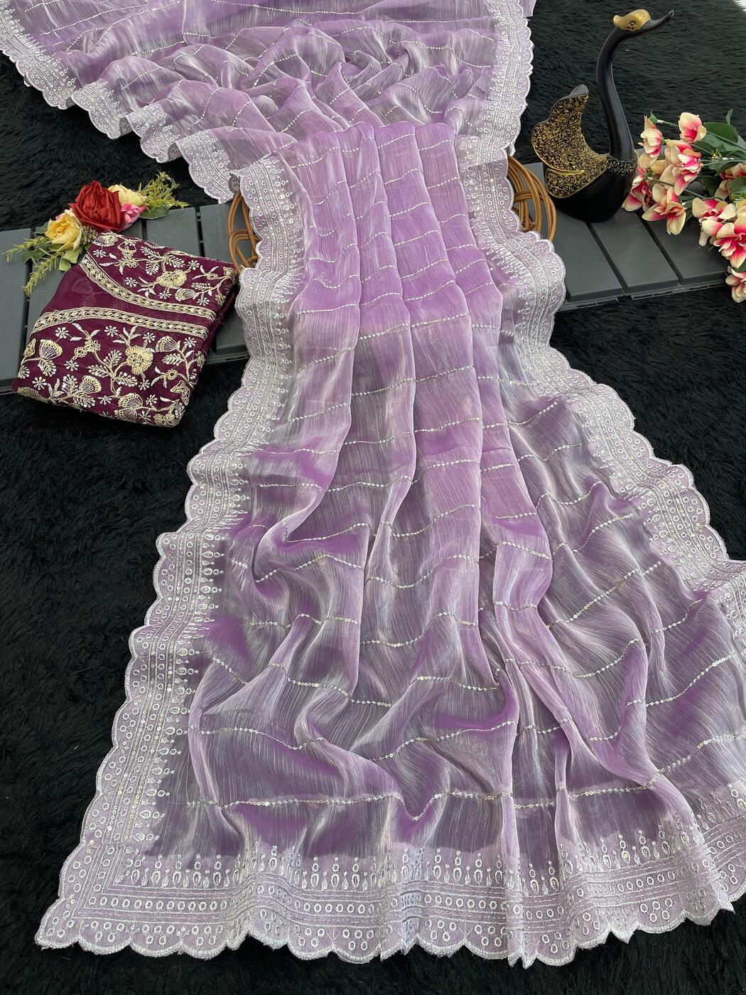 Nemesis Lavender Embroidery Work Organza Silk Saree With Glamorous Blouse Piece