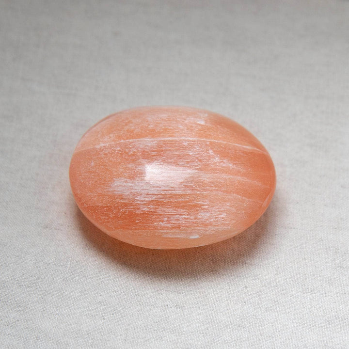 Peach Selenite Palm Stone