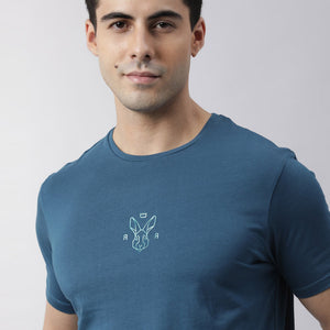Rare Rabbit Men's Oval Petrol Cotton Fabric Crew Neck Half Sleeves Slim Fit Logo Detailing Solid T-Shirt