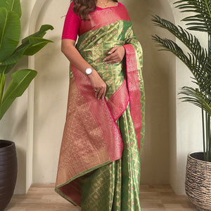Groovy Green Soft Banarasi Tissue Silk Saree With Vivacious Blouse Piece