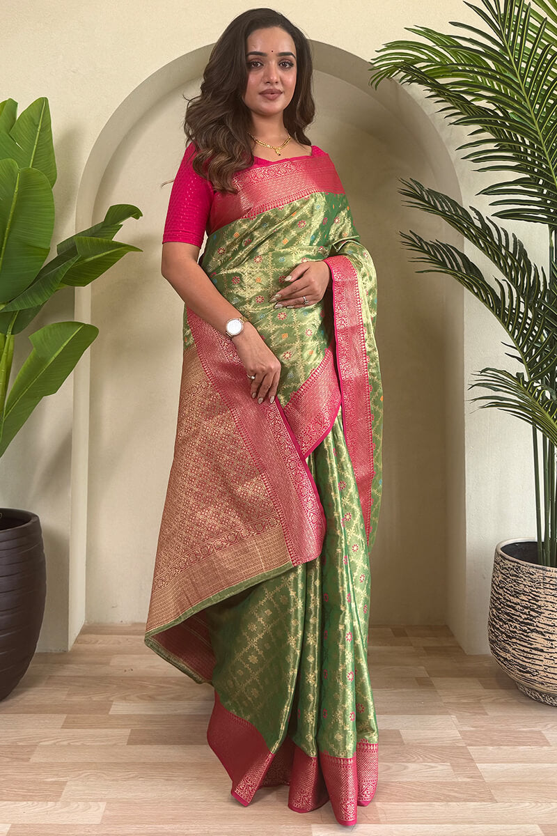 Groovy Green Soft Banarasi Tissue Silk Saree With Vivacious Blouse Piece