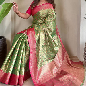 Groovy Green Soft Banarasi Tissue Silk Saree With Vivacious Blouse Piece