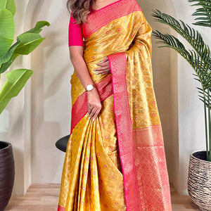 Staring Yellow Soft Banarasi Tissue Silk Saree With Ravishing Blouse Piece