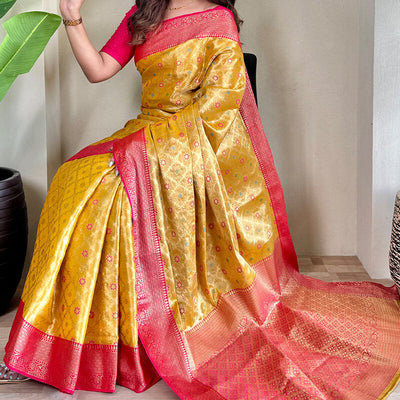 Staring Yellow Soft Banarasi Tissue Silk Saree With Ravishing Blouse Piece