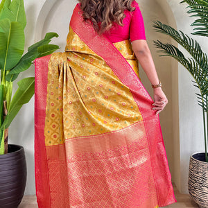Staring Yellow Soft Banarasi Tissue Silk Saree With Ravishing Blouse Piece